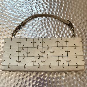 Trina Turk cream handbag